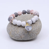 Gemstone Bracelet with Howlite, Pink Zebra, and Dendrite Opal Charm