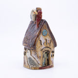 House – Round Seagull House (brown with porthole window)