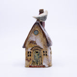House – Round Seagull House (brown with porthole window)